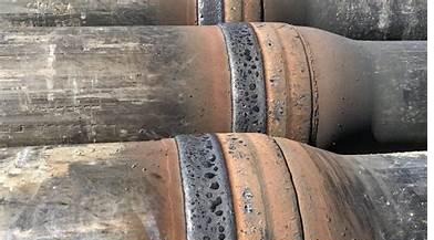 Close-up of hardbanded drill pipe tool joint