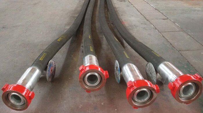 Hydrotest high pressure mud hoses with test caps fitted